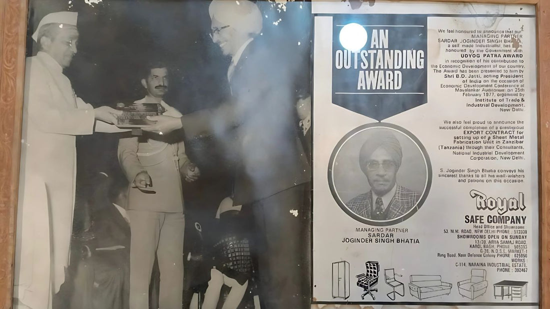 Black and white photo of an award ceremony honoring Sardar Joginder Singh Bhatia from Royal Safe Company